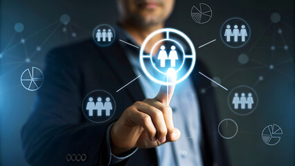 Businessman is pointing at a digital screen with target customer icons, representing business marketing strategy and audience targeting concept