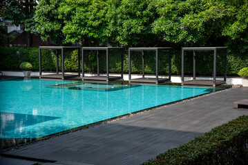 Modern Sofa and furniture on rooftop swimming pool.