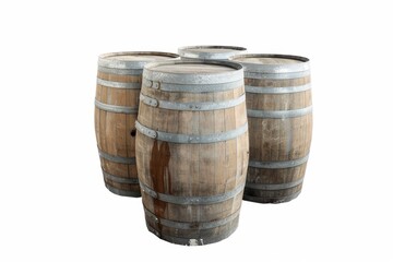 Fototapeta premium Four rustic wooden barrels with metal hoops on white background.