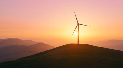 Peaceful Sunrise Landscape with Wind Turbine on Green Hill and Misty Mountains
