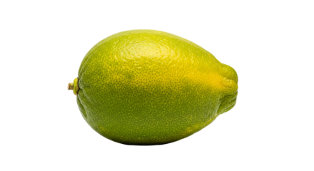 Lime is resting against a stark background displaying its yellow and green color gradient.