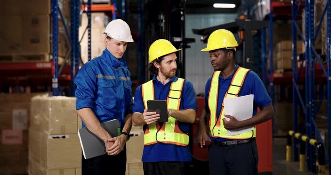 african american warehouse staff discussing shipment issue with supervisor while pointing during forklift task collaboration and teamwork highlighted in logistic stock preparation scene