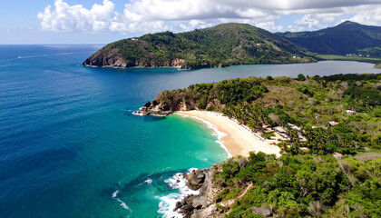 Fototapeta premium Aerial photography over the sea coast on love beach, or playa del amor