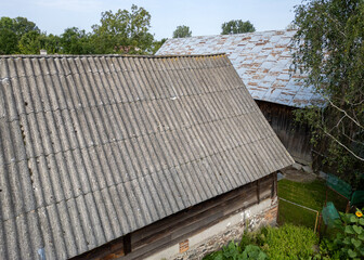 Asbestos roof of an old farm building on a farm in Mazowsze region of Poland