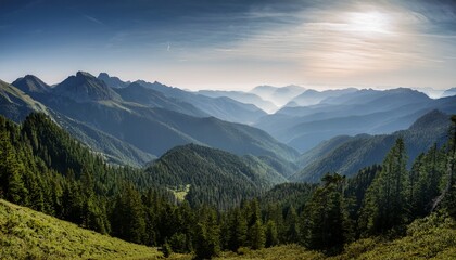 Fototapeta premium a massive mountain range covered with dense forests stretches to the horizon where it dissipates into a light haze the image illustrates the majesty tranquility and natural beauty of the mountai