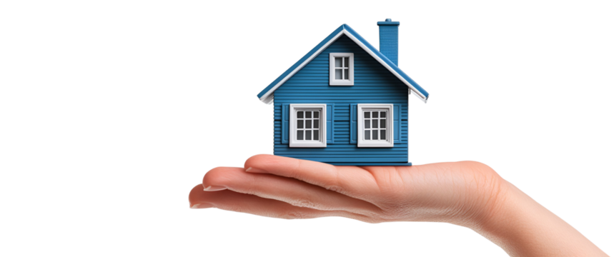 Close up of a human hand holding a small blue model house with white windows and chimney isolated on transparent background