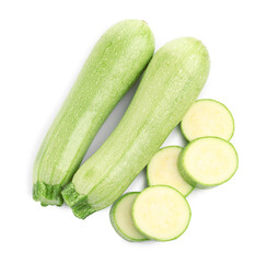 Fresh whole and cut zucchinis isolated on white, top view