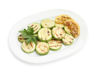Delicious grilled courgette slices with lemon and parsley isolated on white, above view