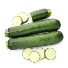 Whole and cut fresh zucchinis isolated on white, top view