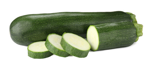 Whole and cut fresh zucchinis isolated on white