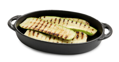 Delicious grilled courgette slices in baking dish isolated on white