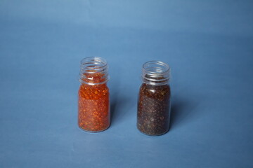 Fresh silica gel orange appears bright orange and dry, while moisture-saturated silica gel turns dark green, showing it has fully absorbed humidity.