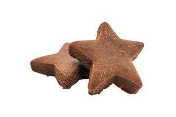 Two star shaped chocolate cookies on black background