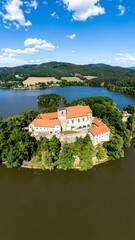 Obraz premium Aerial view of a monastery on an island (1)