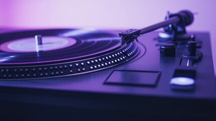 Close-up of a modern turntable with a spinning vinyl record, lit in vibrant purple and blue hues