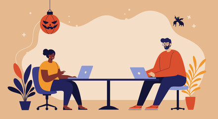 Diverse colleagues work on laptops at an office desk, adorned with Halloween decorations, symbolizing productivity and seasonal spirit in a modern workspace.