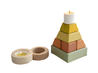 Wooden stacking toy with candle and tealight holder isolated on a transparent background image