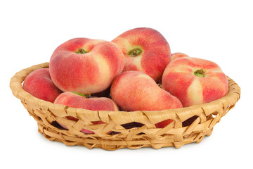 chinese flat donut peaches in a wicker basket isolated on white background