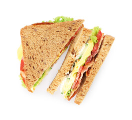 Tasty sandwiches with bacon, cheese and vegetables isolated on white, top view