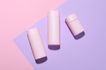 Cosmetic products on color background, flat lay. Mockup for design