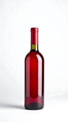 Red wine bottle against white backdrop