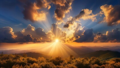 Obraz premium golden sunlight shining through dramatic clouds creating a serene and ethereal sky