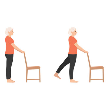 Elderly woman performing leg exercises holding onto a chair for support demonstrating glute kickbacks for strength and balance