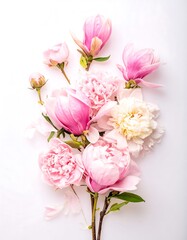 Obraz premium Delicate arrangement of pink and white flowers, magnolias, and peonies, displayed on a plain white background, showcasing a soft and romantic aesthetic.