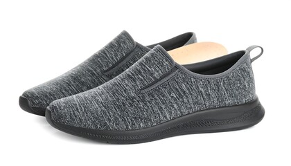 Gray slip-on sneakers on white background