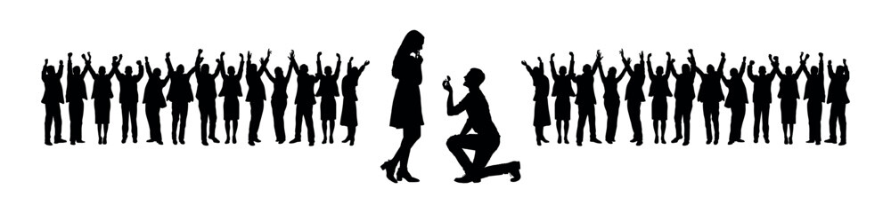 Man kneeling proposing woman in front of people silhouettes on white background.