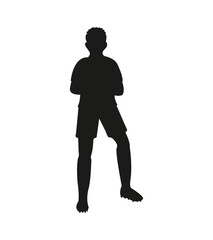 Silhouette of a soccer player standing with crossed arms football player athlete