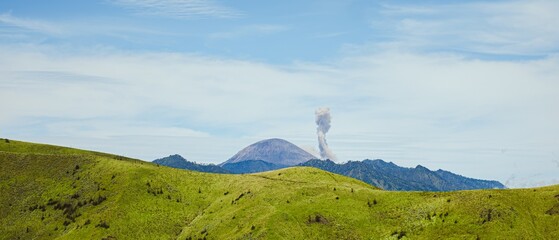 Fototapeta premium Bukit Premium, East Java, Indonesia with Erupting Mount Semeru