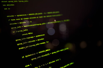 Close-up view of computer programming code on a dark screen, representing software development, cybersecurity, coding, and IT technology in a modern digital environment.