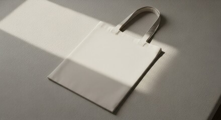 Minimalist Canvas Tote Bag with Dramatic Shadow and Soft Lighting