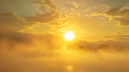 Fototapeta premium Golden sunrise illuminating misty mountains and tranquil waters at dawn