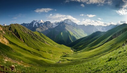 Obraz premium majestic mountain range panorama with lush green valley