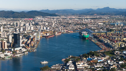 Aerial view of the busy Port of Itajaí with cargo ships and colorful containers in Santa Catarina.