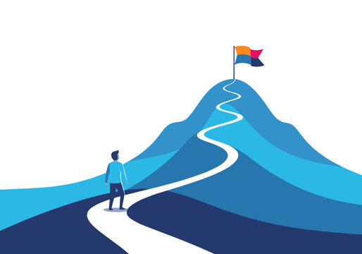 Man standing at the beginning of a winding road leading up a mountain to a flag on the summit representing the journey towards achieving goals and success