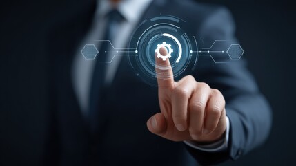 Fototapeta premium Businessman touching digital gear icon representing innovation and technology in modern industry, symbolizing automation and process improvement for corporate success