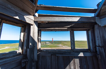 view from the window of an old ruined lighthouse on the shore of the Arctic Ocean