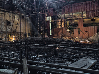 inside a building burned down and destroyed during the war in a city in Ukraine