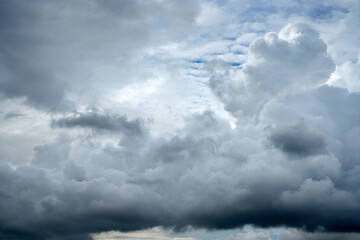 Fototapeta premium storm clouds over the blue sky