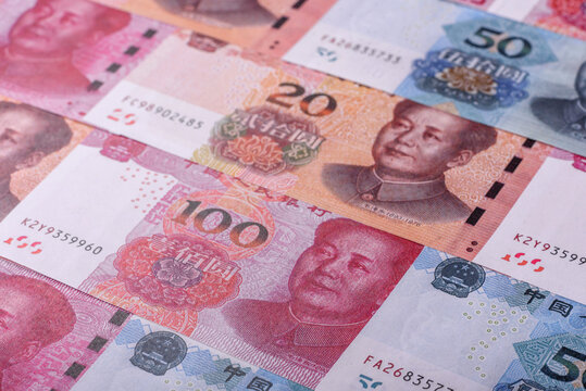 Cash, paper yuan banknotes for business transactions, financial background. Yuan banknotes