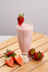 Glass of Strawberry Juice with Milk – Fresh Creamy Pink Smoothie Photography