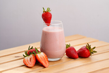 Glass of Strawberry Juice with Milk – Fresh Creamy Pink Smoothie Photography