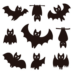A collection of nine black bat silhouettes in various poses on a white background isolated on transparent background