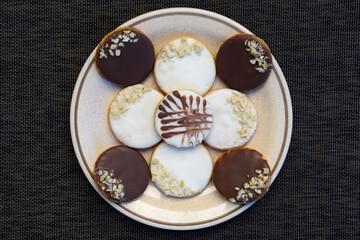 Sandwich cookies with peanut butter, chocolate and chopped cashews. More variation of cookies from one dough