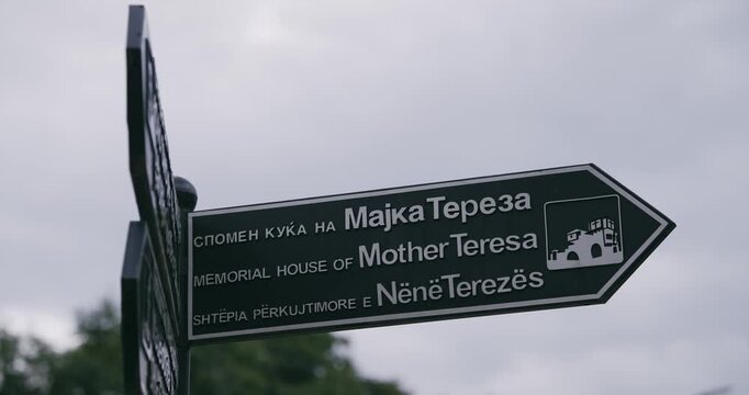 Street sign directing to the Memorial House of Mother Teresa in Skopje, the capital of North Macedonia