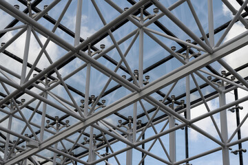 Glass and metal canopy structure – modern architectural construction with steel profiles and tubes