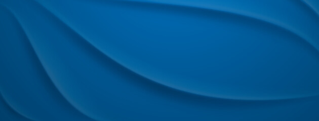 Fototapeta premium Smooth blue curves create a flowing abstract background effect.